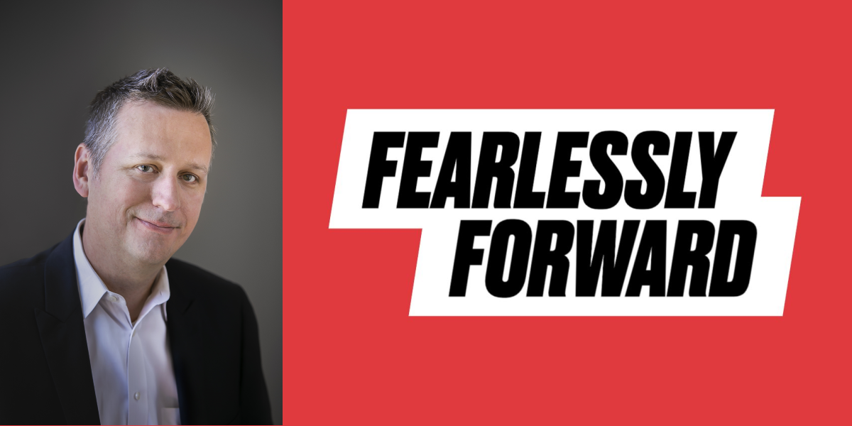 Photo of Charles Harry with the words "Fearlessly Forward" next to his image
