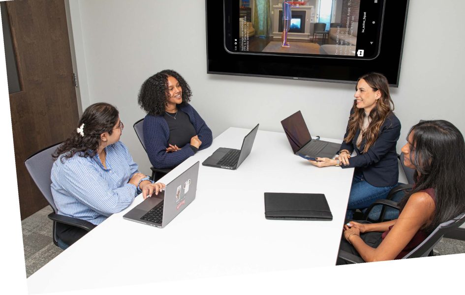 Galina Reitz working with grad students on BeneKinetic project