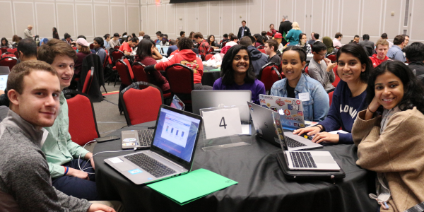 Photo of college students competing at the annual Info Challenge