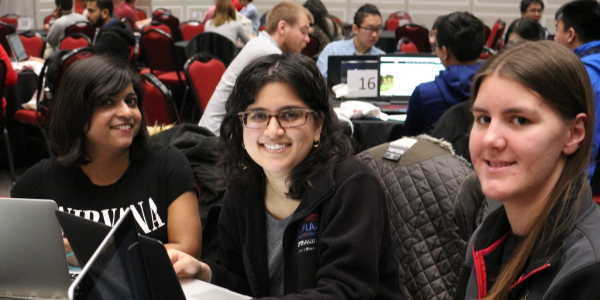 Photo of college students competing at the annual Info Challenge