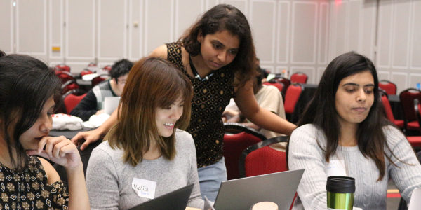 Photo of college students competing at the annual Info Challenge