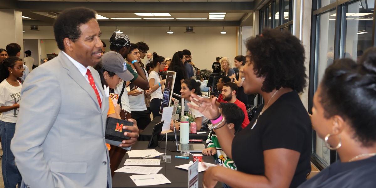 UMD President Darryll Pines and INFO's Monique McIntyre celebrate with students and partners at the INFO Fall 2024 Welcome Back Event