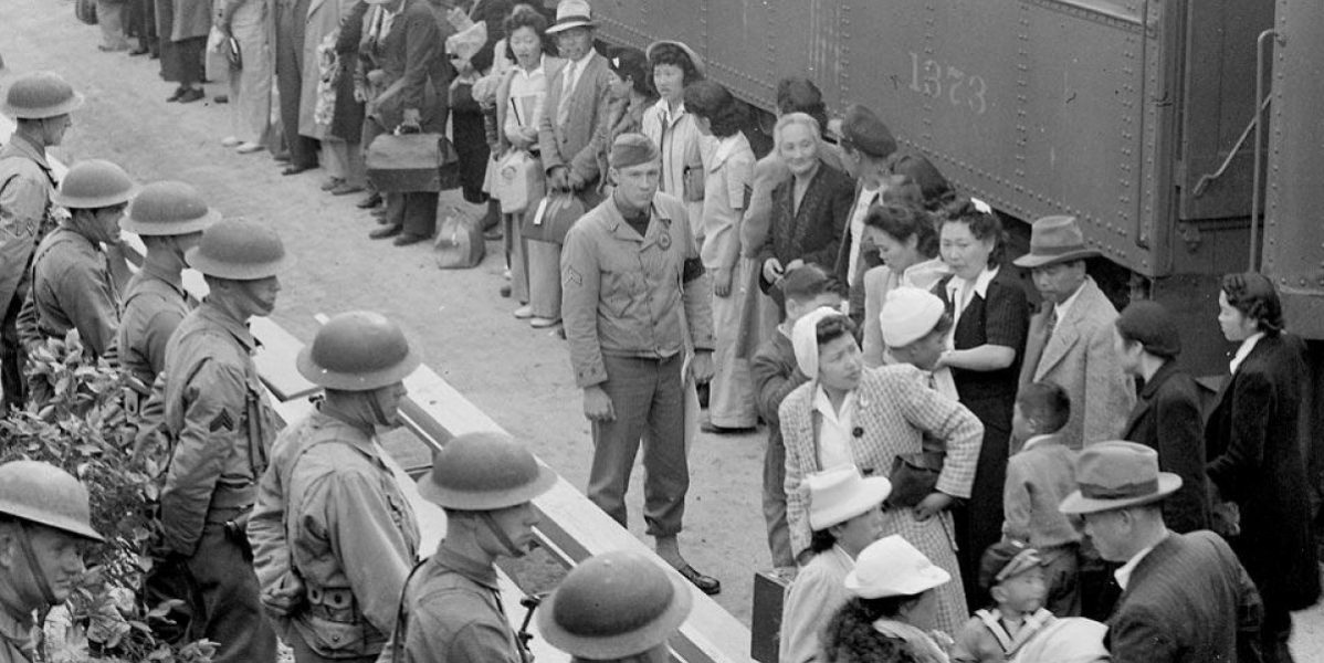 Japanese Americans arrive by train to the Santa Anita Park assembly center April 1942