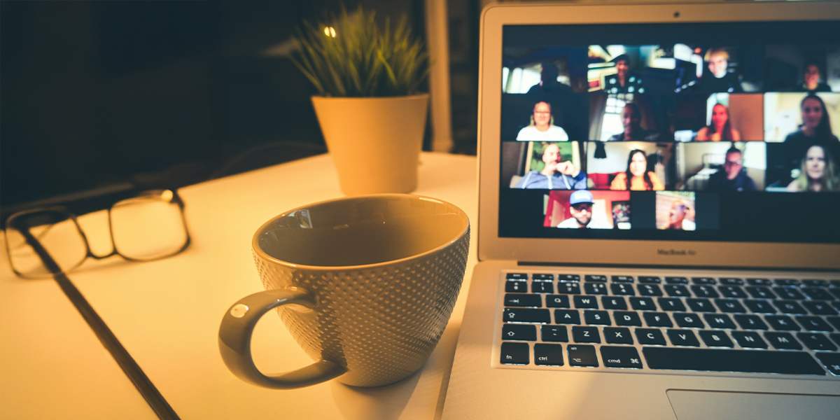 Zoom call on a Mac Book with tea