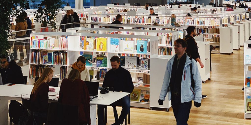 library with a group sitting at a table