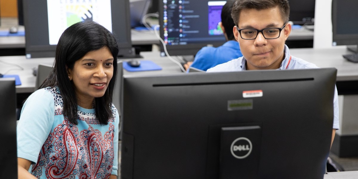 Dr. Mega Subramaniam and research admin team member Luis Cortes