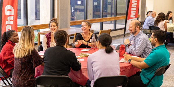 Open House Photo of Students Talking to Faculty