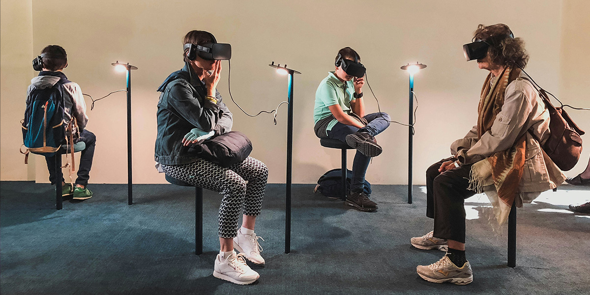 People learning using virtual reality headsets.
