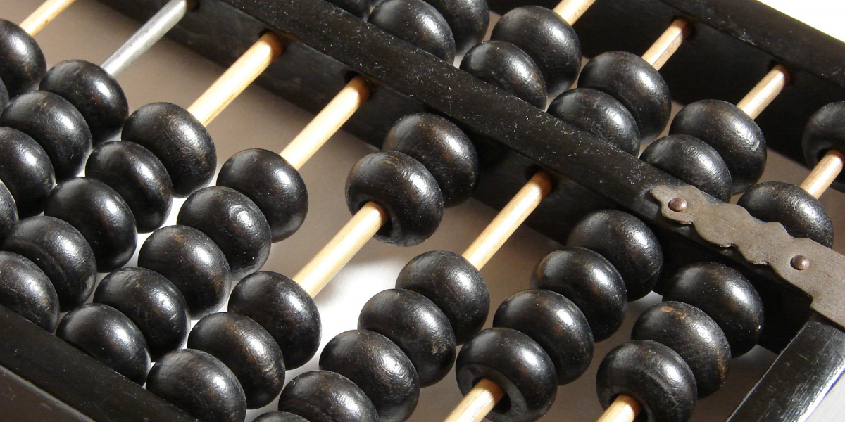 close up photo of a black wooden abacus