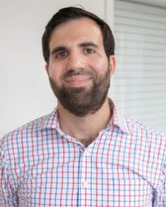 headshot of Dr. Daniel Greene in a polo