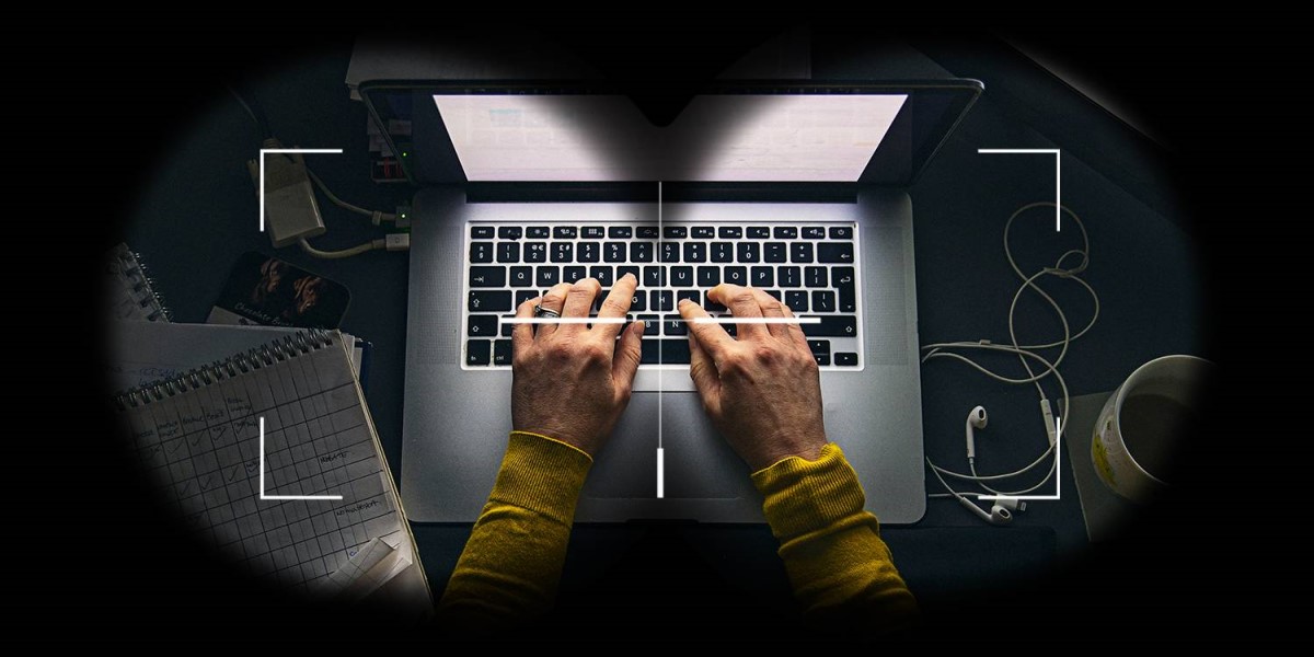 Image of hands typing on a laptop keyboard